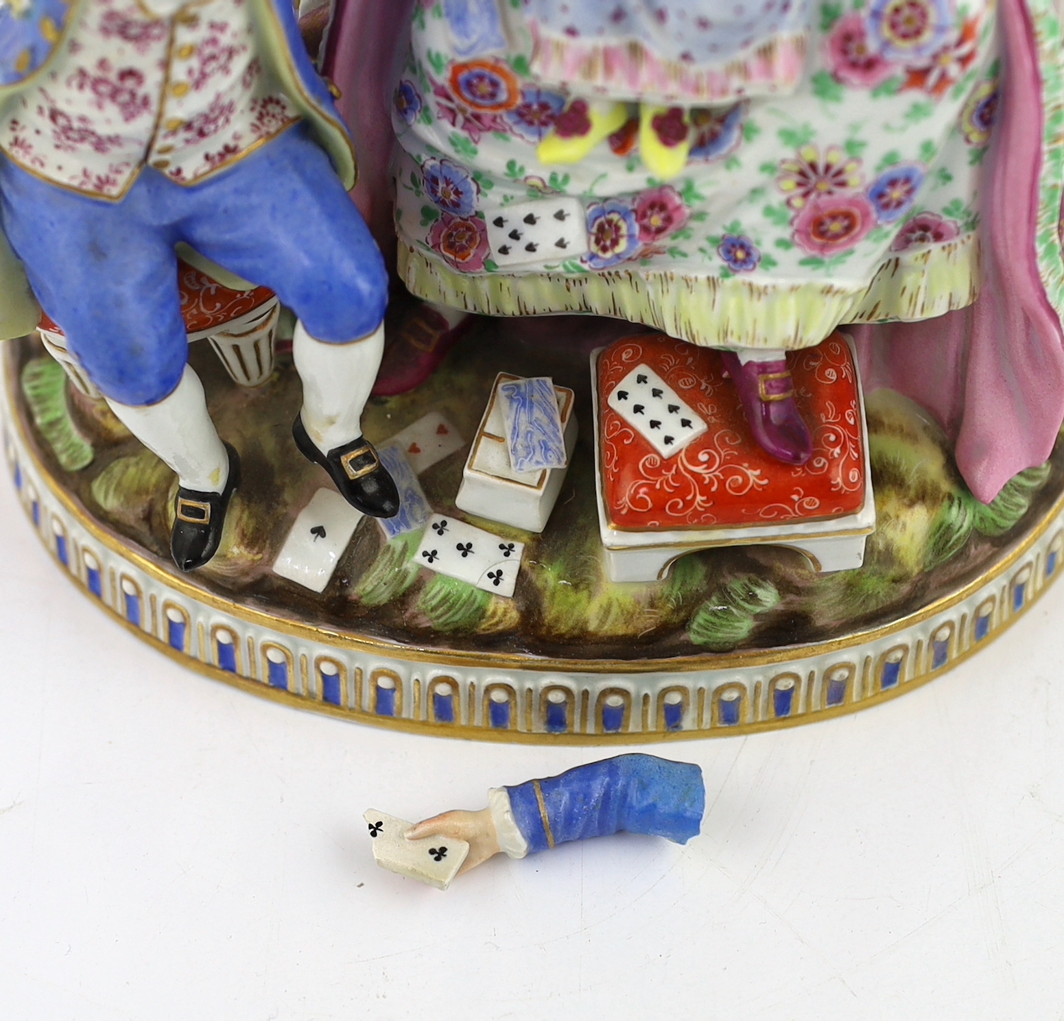 A Meissen group The Good Mother, 19th century, arm detached but present